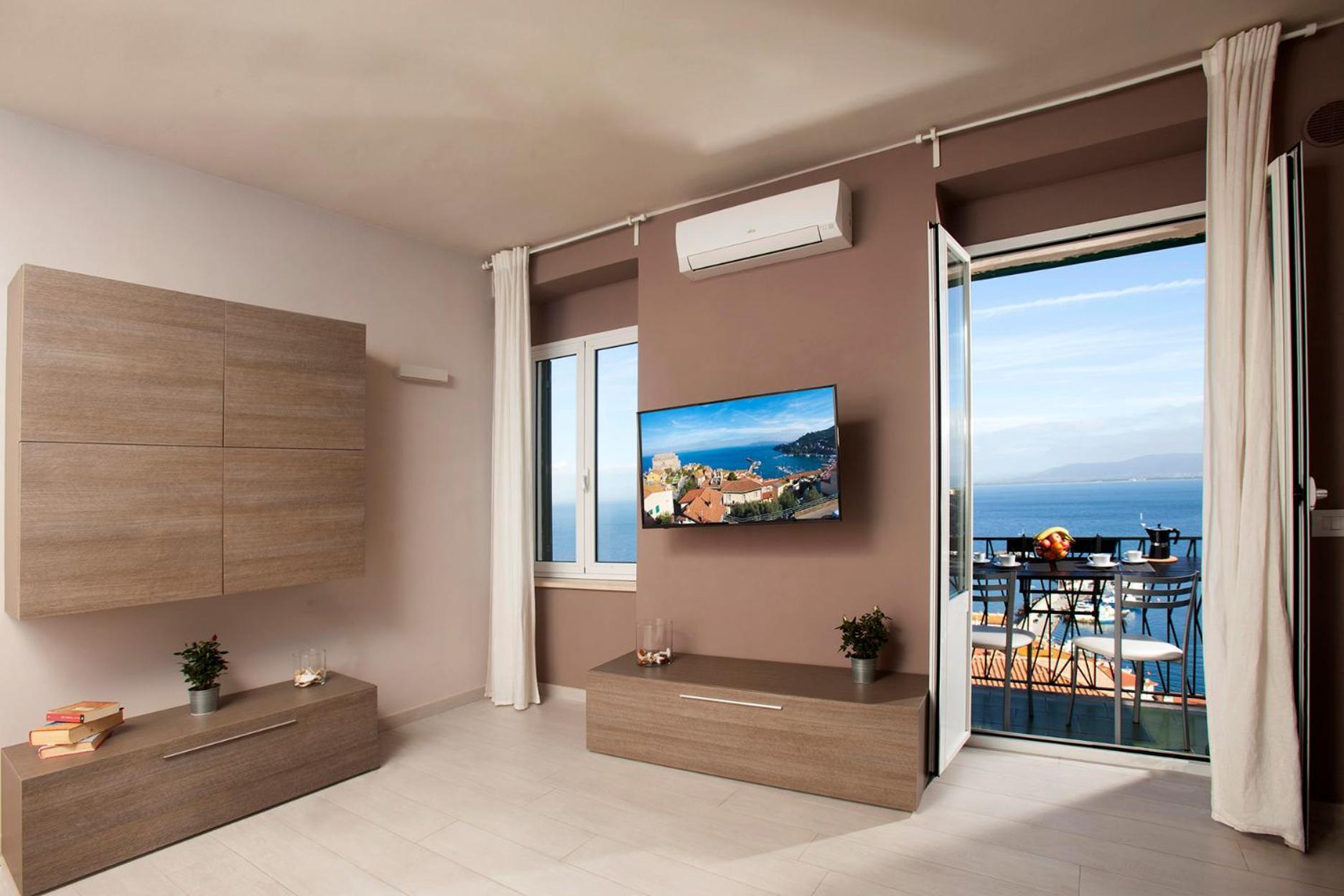 Апартаменти La Casa Al Mare Порто-Санто-Стефано Екстер'єр фото